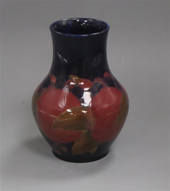 A Moorcroft Pomegranate pattern vase height 18cm